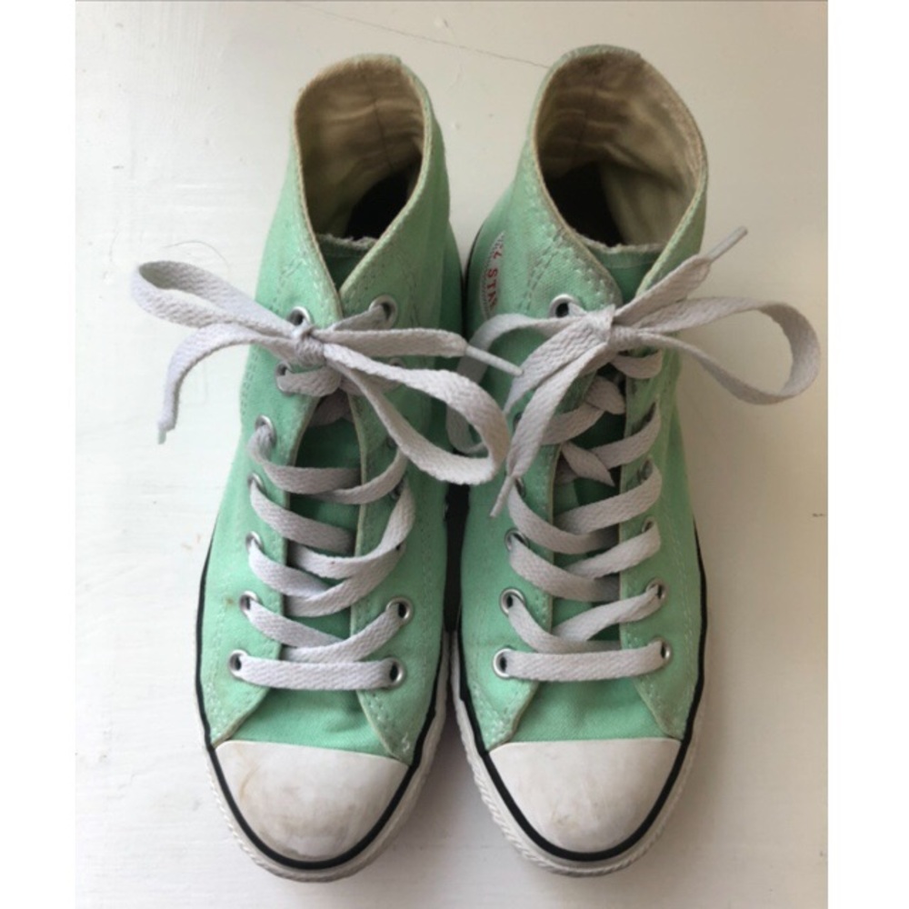 Pale green Converse tennis shoes. Kids size 3.